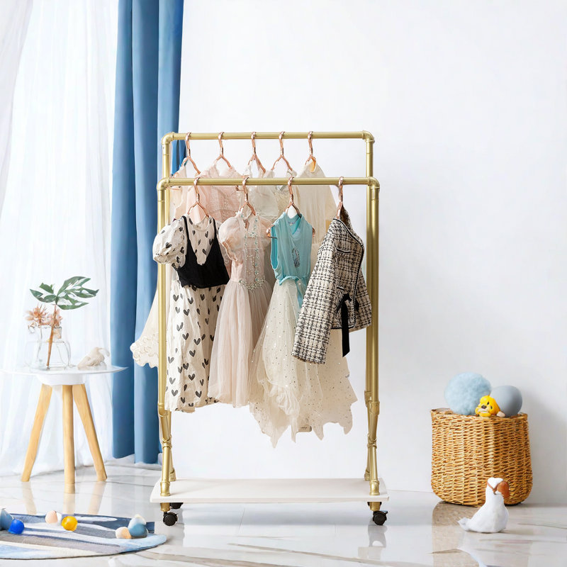 Gold clothing rack on wheels shop